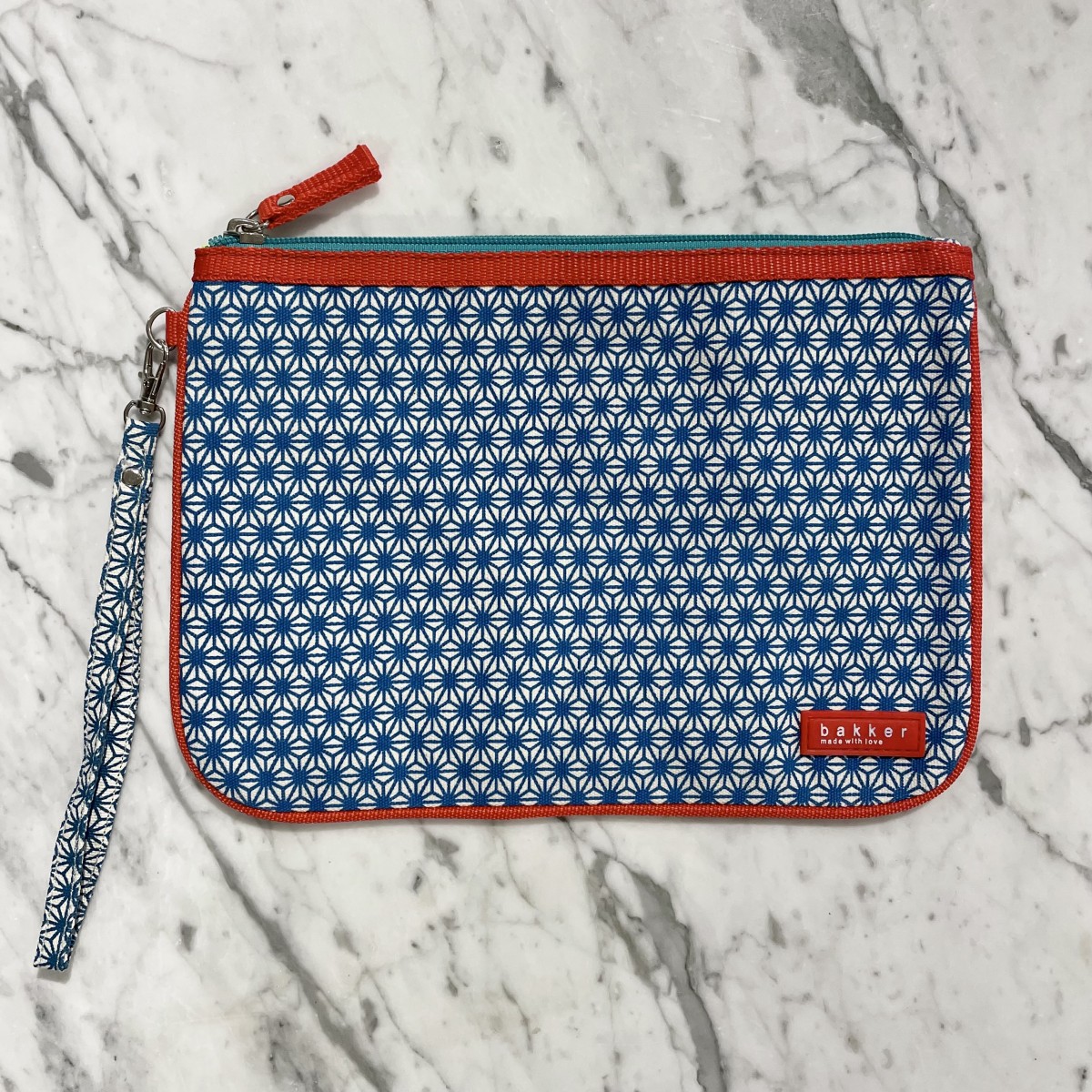 Bakker - Pochette bleue à motif fleurs